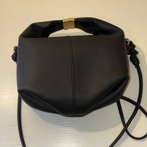 Chic Black Crossbody Bag with Gold Accent